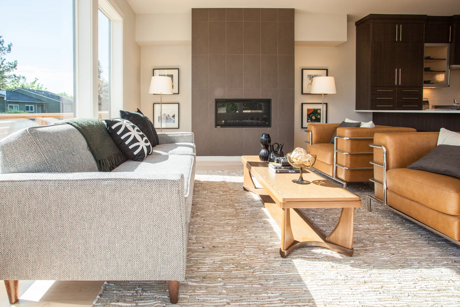 Custom-build modern kitchen with dark cabinets and pendant lighting